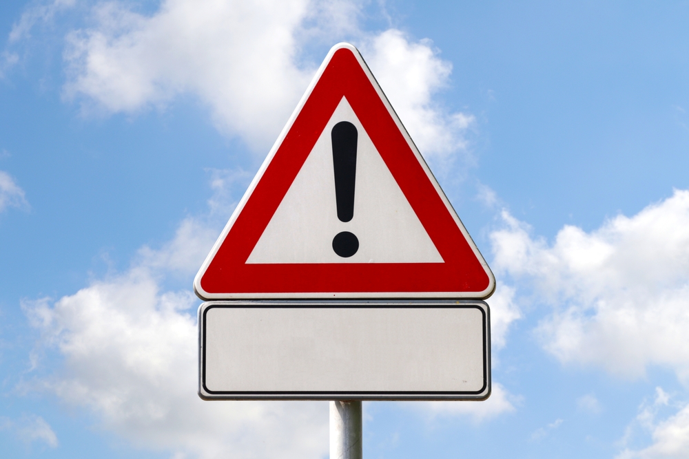 Warning,Road,Sign,With,Exclamation,Mark,And,An,Empty,Space